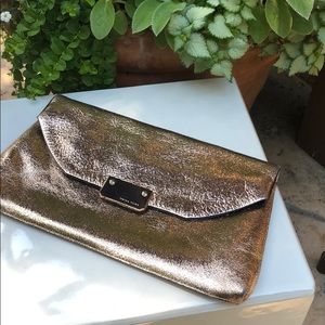 Trina Turk rose gold Gemma  leather clutch